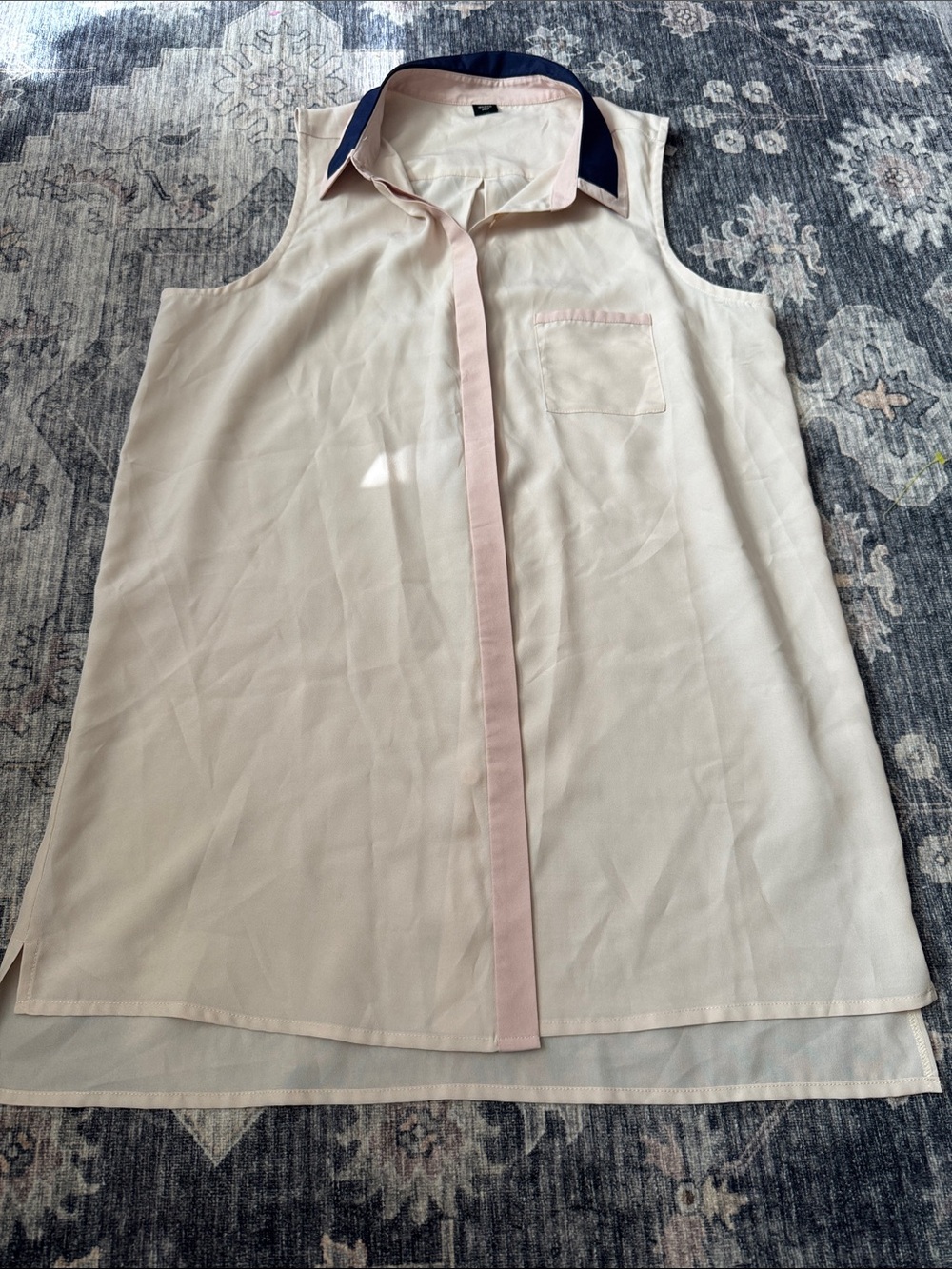 Sleeveless Cream Blouse with Pink Placket and Navy Collar Detail